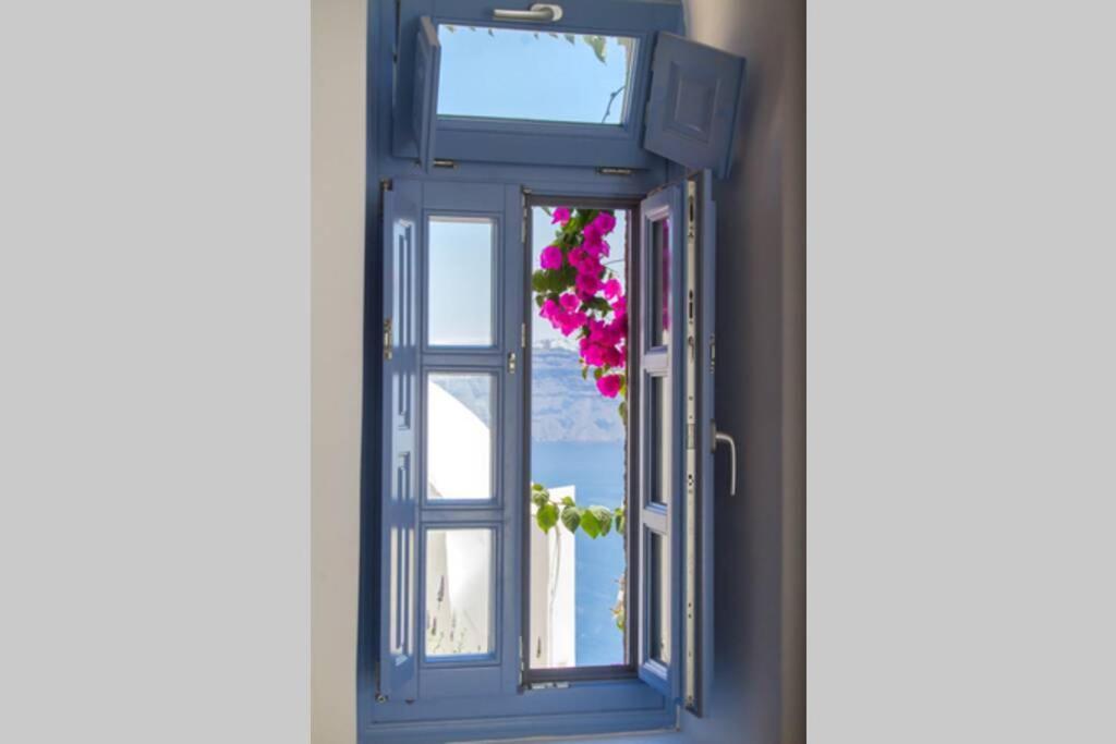 Twin Cave House Villa Oia  Exterior photo